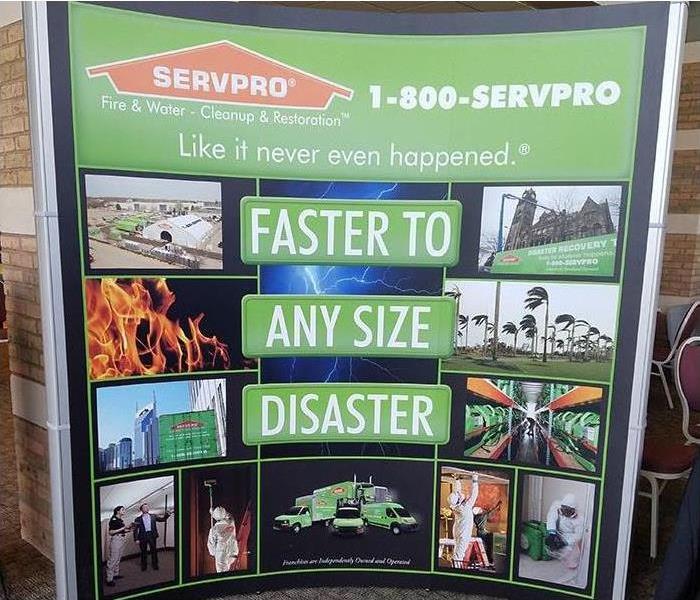 A board showing that many services of SERVPRO with the words "Faster To Any Disaster."