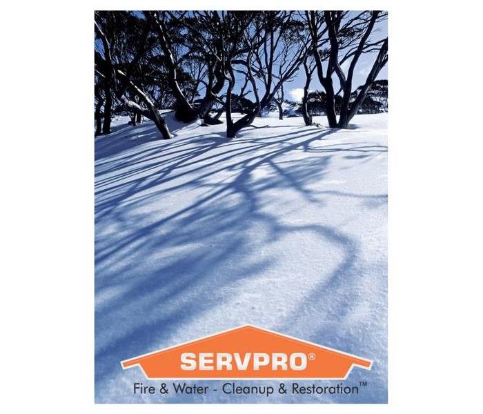 Snow covered ground with a SERVPRO logo.
