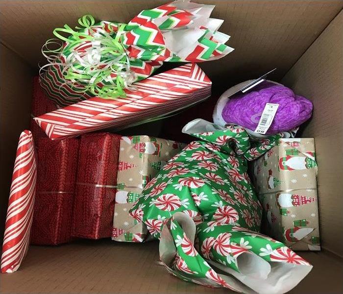 A box full of Christmas presents.