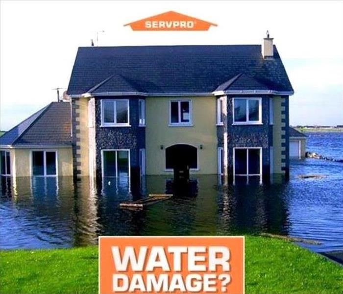 A house sitting in flood waters.