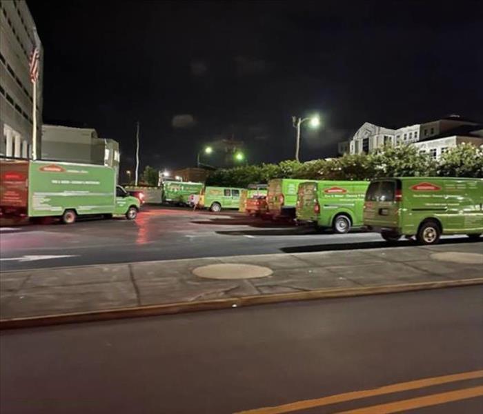 SERVPRO vehicles parked outside a building